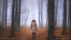 Woman Walking Foggy Forest During Autumn